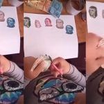 Niña recorta billetes para pegarlos en su tarea