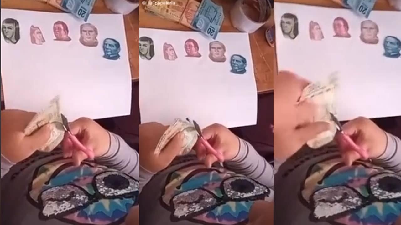 Niña recorta billetes para pegarlos en su tarea