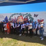 Mujeres realizan mural dedicado a la sororidad